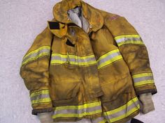 Photograph of a dirty HiViz firefighter uniform jacket. Fireman Jacket, Galo Thymos, Firefighter Uniform, Firefighter Jacket, Uniform Jacket, Match Me, Clothing Rack, Jacket Style