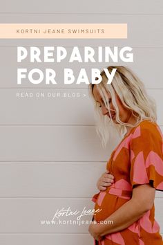 a pregnant woman standing in front of a white wall with the words preparing for baby