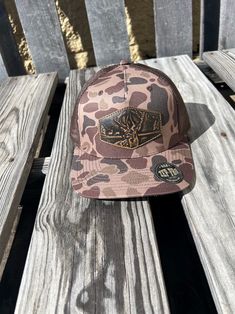 Old School Brown Camo Leather Buck Patch Richardson 112 Cap Show your passion with an original Zep-Pro hand burnished leather Buck patch sewn on a classic Richardson 112 trucker hat. The deer imagery on these trucker caps taps into our intrinsic connection to nature and wildlife. It is a stylish and unique way to show enthusiasm. This Zep-Pro hat is constructed of cotton and poly mix fabric, accented by a 100% full grain leather Buck patch, proudly displayed on the front. Brown hand burnished le Oak Camo Hat, Carhartt Work Pants, Twisted X Shoes, Military Style Camouflage Snapback With Curved Brim, Dan Post Boots, Camouflage Military Trucker Hat One Size, Military Camouflage Trucker Hat One Size, Work Pants Women, Men Carhartt