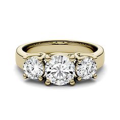 three stone engagement ring in yellow gold with diamonds on the sides and four stones at the top