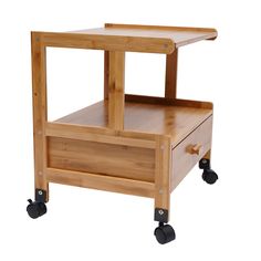 a small wooden cart with wheels on the bottom and one drawer at the top that is open