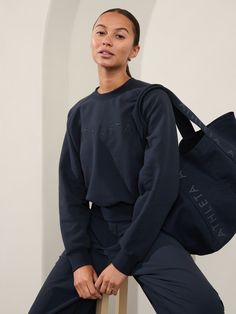 FOR: Lounge and everyday FEEL: Plush stretch fleece has a soft, brushed interior FAVE: Lowkey embroidered logo uplifts your fit Relaxed with room to move or layer Body length: Regular 22.6", Petite 21.6", Tall 23.6". Navy Crew Neck Athleisure T-shirt, Navy Cotton Sportswear Sweatshirt, Navy Sporty Relaxed Fit T-shirt, Sporty Navy Crew-neck Sweatshirt, Navy Relaxed Fit Long Sleeve T-shirt, Bra Dress, Crew Sweatshirts, Active Wear For Women, Jacket Tops