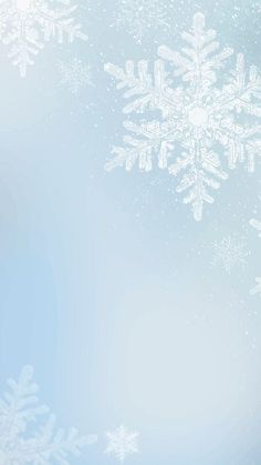 a blue and white background with snow flakes