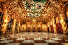 an ornately decorated room with checkered floor and ceiling