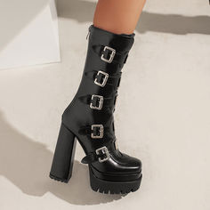 Looking for a unique and stylish way to add some edge to your wardrobe? Check out our gothic platform boots! These beautiful black boots are perfect for dressing up or down. and they really make a statement. They feature buckles for a dramatic look. and they're calf-height for added style. Plus. they have a chunky platform heel that provides both comfort and style.Whether you're hitting the town or just hanging out at home. our gothic platform boots are sure to add some fun and flair to your loo Gothic Platform Boots For Fall, Black Platform Boots For Cosplay, Gothic High Heel Combat Boots For Fall, Punk High Heel Platform Boots With Buckle Closure, Black Alternative Combat Boots For Party, Emo Platform Boots For Cosplay, Black Alternative Style Combat Boots For Party, Black Gothic Platform Combat Boots, Gothic Ankle Platform Boots For Fall