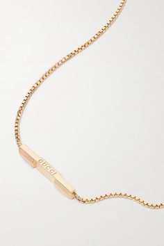 Gucci's necklace is part of the label's 'Link to Love' collection, which explores modern romance. It has been made in Italy from polished 18-karat gold and strung with a slim bar etched with the brand's name. The chain is adjustable, so you can wear it shorter or longer, depending on what you're layering it with. Designer Yellow Gold Necklaces With Polished Finish, Designer Yellow Gold Polished Necklace, Designer Yellow Gold Necklace With Polished Finish, Designer Yellow Gold Necklace For Anniversary, Gucci Necklace With Polished Finish As Gift, Gucci Necklace With Polished Finish For Gift, Gucci Polished Finish Necklace For Gift, Elegant Gucci Necklace With Polished Finish, Gucci Rose Gold Jewelry Gift