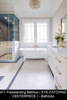 a bathroom with a bathtub, sink and toilet in it's center piece