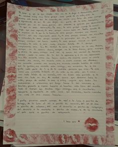 a piece of paper that has been written on it with red lipstick prints and writing