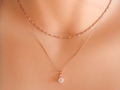 rose gold diamond necklace April birthstone necklace solitaire necklace diamond choker tiny diamond necklace delicate tiny CZ necklace Sterling silver 925 or gold vermeil (gold over sterling silver 925) delicate chain runs through a small sterling silver rhodium plated 925 or gold vermeil pendant. The pendant has in the middle a beautiful small sparkilng cz. The gold vermeil pendant can be yellow or rose gold. You can layer this cz pendant necklace with chain necklaces or charm necklaces! A beau Simple Diamond Jewelry Gift, Simple Diamond Jewelry For Gift, Simple Diamond Jewelry As Gift, Rose Gold Jewelry With Adjustable Chain And Round Pendant, Minimalist Adjustable Rose Gold Jewelry, Adjustable Minimalist Rose Gold Jewelry, Dainty Sterling Silver Pendant Jewelry, Rose Gold Jewelry With Adjustable Chain Pendant, Adjustable Delicate Diamond Cut Jewelry