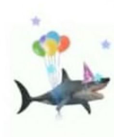 a shark with party hats and balloons floating in the air