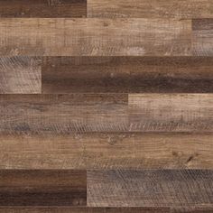 wood flooring that looks like it has been made from different types of planks