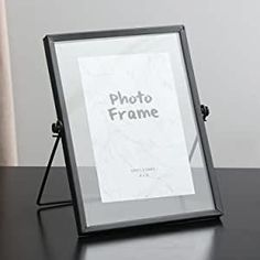 a photo frame sitting on top of a table