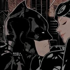 batman and catwoman kissing in the city