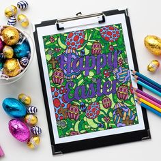 an easter coloring book surrounded by colored eggs and pencils on a white surface with the words happy easter