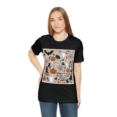 Get Ready for Halloween with Stylish T-Shirts Spice up your wardrobe this spooky season with our exclusive collection of Halloween t-shirts! Whether you're looking for a classic shirt Halloween design or something unique, our Halloween shirts for adults are perfect for any festive occasion. These t-shirts come in a variety of styles and are available as tees for both men and women. Made from high-quality materials like bella canvas shirts, they are comfortable, durable, and perfect for your tshirt outfit. Whether you're going for a casual look or something more stylish, these shirts graphic tees will make a statement. Looking for the perfect gift for a friend? Our Halloween presents include a range of t-shirts that make thoughtful and fun gifts. Whether you're shopping for t shirts for men Spooky Black T-shirt For Fall, Black Short Sleeve Top For Halloween, Black Spooky Shirt With Graphic Print, Spooky Black Shirt With Graphic Print, Black Graphic Print Shirt For Halloween, Black Short Sleeve Shirt For Halloween, Black Halloween Top With Sublimation Print, Spooky Black Short Sleeve Shirt, Black Short Sleeve Spooky Shirt