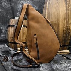 Woosir Genuine Cowhide Leather Cross Body Sling Bag Practical Chest Bag With Zipper For Outdoor, Outdoor Large Capacity Chest Bag Shaped Like A Satchel, Backpack Duffle Bag With Adjustable Strap For Outdoor Activities, Duffle Backpack With Adjustable Strap For Outdoor Activities, Outdoor Satchel Chest Bag With Zipper, Outdoor Satchel Chest Bag With Zipper Closure, Portable Shoulder Bag Backpack For Outdoor, Durable Multifunctional Bag For Adventure, Brown Casual Chest Bag For Outdoor