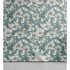 an image of a wallpaper with white flowers on blue and green background in the corner