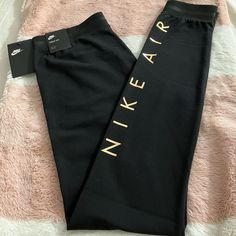 Brand New. Nike Womens Tight Fit Leggings With Rose Gold Metallic Nike Air Logo. Please Give Me An Offer If Interested. Nike High Stretch Black Leggings, Nike High Stretch Black Bottoms, High Stretch Nike Black Leggings, High Stretch Black Nike Leggings, Nike Compression Full-length Bottoms, Nike Compression Full Length Bottoms, Fitted Nike Black Tights, Black Stretch Nike Tights, Nike Black Stretch Tights