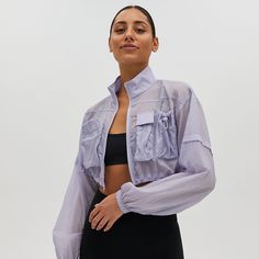 Cropped Semi Sheer Workout Jacket! Size Is M But Could Fit A S/M. Never Worn! Nwot. Spring Nylon Long Sleeve Utility Jacket, Spring Nylon Utility Jacket With Long Sleeves, Fall Nylon Tops With Pockets, Spring Nylon Tops With Pockets, Nylon Fabric, Workout Jacket, Utility Jacket, Bra Tops, Color Purple