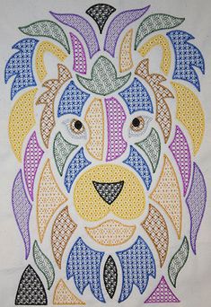 a cross stitch pattern with a lion's head