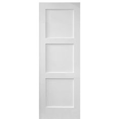 a white door with three panels on the bottom and one panel in the middle, against a