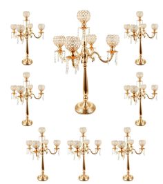 a set of twelve crystal candelabra candlesticks in various shapes and sizes