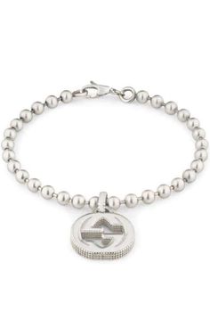 Gucci Interlocking-G Sterling Silver Bracelet YBA479226001. Sterling silver boule bracelet with Interlocking G charm displaying a textured outline. Back To School Haul, Xoxo Jewelry, Jewel Frames, Gucci Bracelet, Jingle Jangle, Textured Bracelet, Gucci Rings, Designer Bracelets, Diamond Heart Pendant Necklace