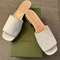 Size 40. Brand New. Never Worn. Current Retail $660. Tan/White. Original Box. Mules Sandals, Shoes Gucci, Mule Sandals, Gucci Shoes, Malaga, House Decor, Original Box, Dream House, Gucci