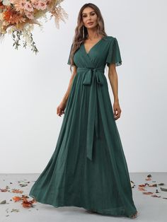 Product Code: FSWD0939 Embellishment: Chiffon Fabric: 100% Polyester Back Style: Zipper Up Fully Lined: Yes Built-in Bra: No Available Color: Dark Green Stretch: Moderate Fits true to size Imported Model Information: Height: 5' 2" Bust: 33.5'' Waist: 24“ Hips: 35.5” wearing US size Small Dark Green Bridesmaid, Latest Bridesmaid Dresses, Dark Green Bridesmaid Dress, Cute Formal Dresses, Green Bridesmaid, Green Bridesmaid Dresses, Butterfly Sleeve, Butterfly Sleeves, Groom Dress