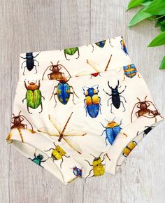 These adorable Bug/Insect  Bummies will look so cute on your baby or toddler. Great for a birthday outfit, vacation or just everyday fun!   The bummies are made of Organic cotton knit fabric that will stretch with your child for a super comfy fit.  All of my items are Handmade to order. Each pattern may vary a bit and no one item will be the same. ❤️ Care Instructions  Wash with like colors on normal settings, NO bleach and AIR DRY to prevent shrinkage.  Light iron if needed.  Because these item Cute Elastic Bottoms For Summer, Cute Elastic Summer Bottoms, Fun Cartoon Print Bottoms For Playwear, Playful Elastic Bottoms For Summer, Playful Elastic Summer Bottoms, Cute Elastic Bottoms For Playwear, White Cartoon Print Bottoms For Summer, Cute Multicolor Bottoms For Playwear, Multicolor Bottoms For Playtime In Summer