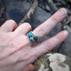 Genuine natural turquoise rings are hammered and oxidized for a rustic elegant style. Can be stacked for a statement or worn individually if your feeling more minimalist. ~Ring set in listing picture is available for purchase in size 8. All other turquoise will vary since each stone is unique like you! ~Set of 7 rings includes: 2) 6mm turquoise 1) 3mm turquoise 4) hammered silver ~Set of 5 rings includes: 2) 6mm turquoise 1) 3mm turquoise 2) hammered silver ~DM me if you would like a different c Bohemian Hand Forged Turquoise Ring, Turquoise Hand Forged Artisan Rings, Rings Turquoise, Silver Turquoise Ring, Hammered Silver Ring, Sterling Silver Rings Set, Ring Stack, 5 Rings, Hammered Sterling Silver