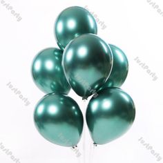 a bunch of shiny green balloons are in the shape of a pyramid on a white background