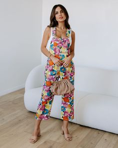 Look blooming fabulous in our Paxton Floral Pocketed Overalls! Bursting with vibrancy and style, these overalls are perfect for those sun-drenched days of summer. Enjoy the comfort of two front pockets as you show off your floral finesse. Get your petals to the party! Size Guide: Lisa is 5’6” tall, and has a 33.25” bust, 26.5” waist, & 35.6” hips. She is wearing a S / US 4 / AU 8. This jumpsuit is true to size. Material: 100% denim cotton. Feature: Lightweight Denim Fabrication. Sleeveless. Stra Overall Straps, Loose Jumpsuit, Cotton Jumpsuit, Floral Jumpsuit, Denim Cotton, Daily Dress, Short En Jean, Shop Maxi Dresses, Relaxed Style