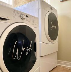 a washer and dryer sitting next to each other