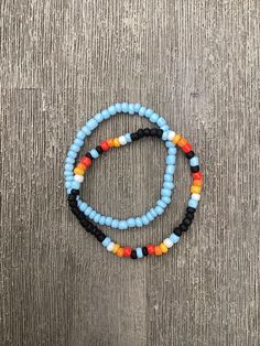 These handmade western bracelets are comfortable, super stretchy and fun! 🤠 Casual Blue Beaded Bracelets For Festivals, Casual Turquoise Beaded Bracelets For Festival, Southwestern Style Blue Bracelets For Beach, Casual Wrap Bracelet With Round Beads For Festival, Casual Stretch Bracelet With Letter Beads For Festivals, Casual Black Beaded Bracelets For Festival, Casual Blue Stretch Bracelet For Festival, Casual Stretch Bracelet For Festivals, Southwestern Style Beach Bracelets With Round Beads