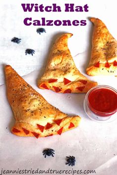 three pieces of pizza sitting on top of a white paper