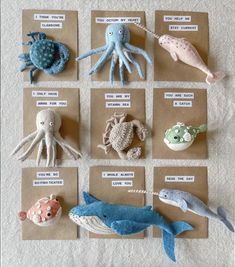 an assortment of sea animals displayed on brown paper