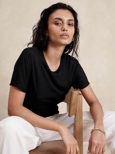 Ideal for channeling the season's ode to 90s sheer styles, this fitted t-shirt is cut from a semi-sheer, ribbed fabric so you can layer it or wear it solo as you please.  Fitted.  Sustainability: Made with TENCEL™ lyocell, a sustainably sourced fiber from responsibly-harvested trees.  Crew neck with button-loop at back.  Straight hem.  Fitted.  Short sleeves.  Hip length.  Model: Size S, 5'10" (178cm). High Top Adidas, Toddler Jeans, Swimwear Cover Ups, Soft Natural, Swimwear Cover, Set Outfit, T Shirt Vest, Summer Baby, Ribbed Fabric