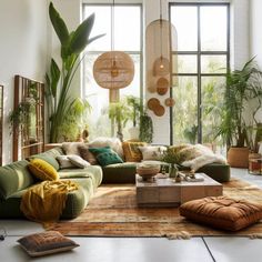 a living room filled with lots of plants and furniture