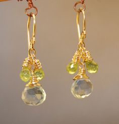 Victorian 199 Peridot & blue topaz earrings by CalicoJunoJewelry, $40.00 Topaz Gemstone Dangle Jewelry, Nickel-free Peridot Elegant Jewelry, Handmade Peridot Dangle Jewelry, Elegant Nickel-free Peridot Jewelry, Elegant Peridot Nickel-free Jewelry, Gold Peridot Gemstone Earrings, Peridot Dangle Earrings With Ear Wire, Teardrop Peridot Jewelry For Anniversary, Teardrop Peridot Birthstone Jewelry