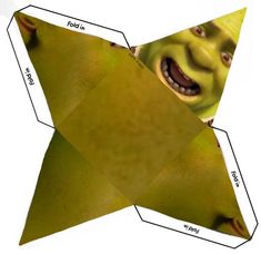 an origami star with a green face and two faces on the top one