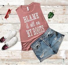 Blame it all on My Roots Flowy Scoop Muscle Tank So cute and extremely comfortable! Multiple colors available. Pictured in black, white, mauve, green and heather gray Heather gray and white will have black lettering, all other colors will have white lettering unless otherwise specified A feminine version of the muscle tank, this must-have style is designed with our exceptionally soft poly-viscose fabrication that softly drapes around curves. The modern elongated armholes and curved bottom hem ma Fall Casual Graphic Print Tank Top, Casual Cotton Tank Top With Text Print, Casual Pink Tank Top With Letter Print, Casual Pink Letter Print Tank Top, Casual Soft-washed Tank Top, Pink Casual Tops With Comfortable Fit, Casual Pink Tops With Comfortable Fit, My Roots, Muscle Shirt