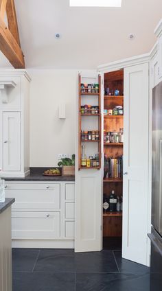 the kitchen is clean and ready to be used as a storage area for food items