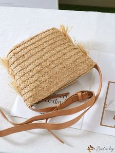 BirdinBag - Chic Fringed Shoulder Bag: Woven Beach Style with Tassel Detail Trendy Beach Straw Bag With Tassels, Trendy Vacation Bag With Fringe, Trendy Vacation Shoulder Bag With Fringe, Trendy Fringe Vacation Bag, Trendy Fringe Shoulder Bag For Vacation, Trendy Beach Bags With Tassels, Casual Straw Bag With Tassels For Vacation, Trendy Beach Bag With Fringe, Travel Straw Shoulder Bag With Fringe