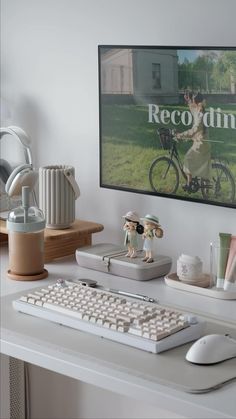 a desk with a computer keyboard and mouse