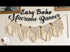 the easy boho macrame banner is hanging on the wall