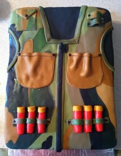 a camouflage vest with four pairs of rubber boots attached to the front and side pockets