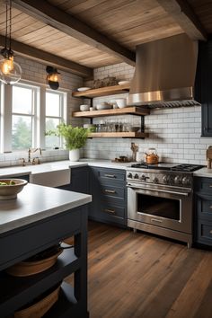 a kitchen with wooden floors and white walls