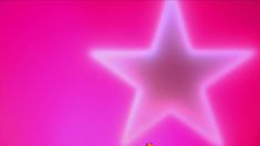 a person standing in front of a star on a pink and purple background with white lights