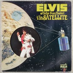 elvis's album cover shows the earth and space shuttle with an astronaut in it